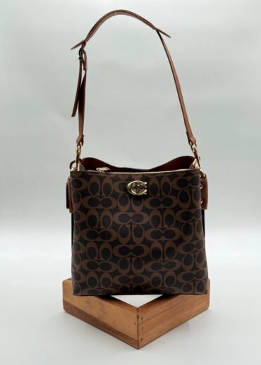 Coach monogram kilitli büzgülü kahve taba çanta